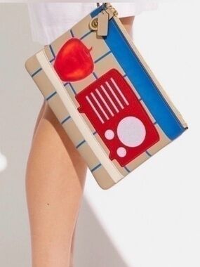 COACH X TOM WESSELMANN LARGE APPLE SPEAKER IPAD CLUTCH